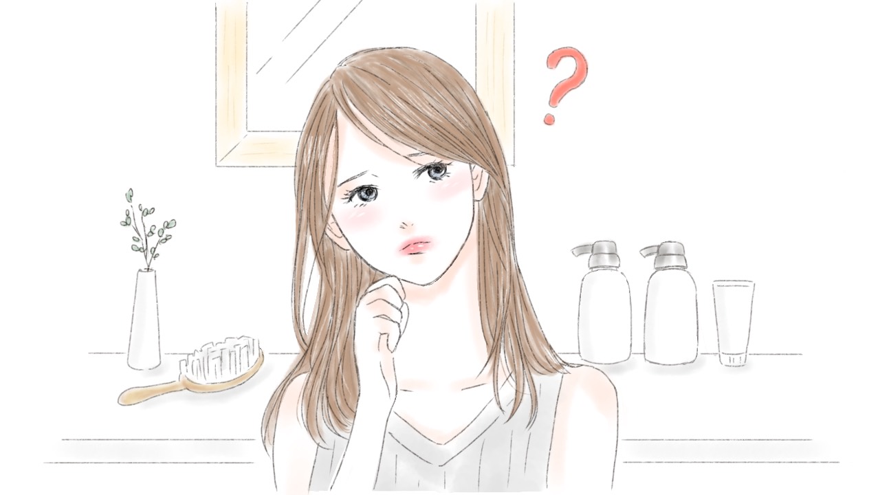 シャンプーについて悩む女性