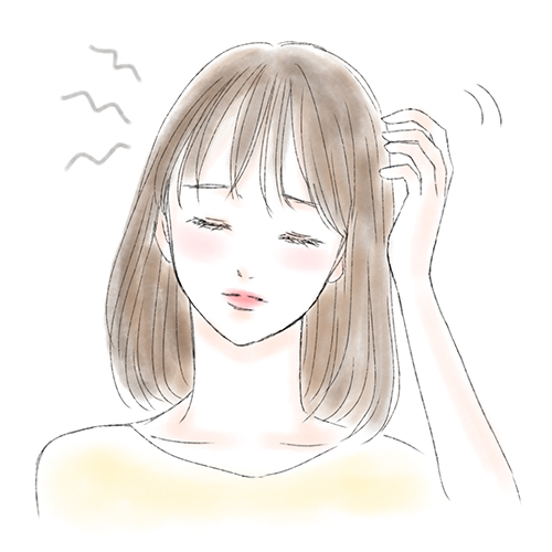 髪のフケ・かゆみが気になる女性